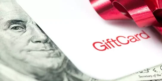 Gift Cards for Cash Exchange with Dollar Bill and Red Bow