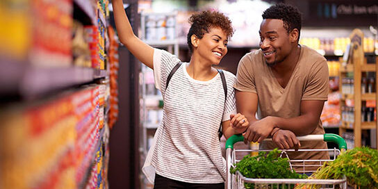 Check Into Cash personal loans and financial services make it easy for this couple to grocery shop with confidence.